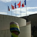 Coloured Cone Sculpture at Caen, with Flags - Sept 2010