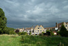 Dark clouds over suburbia