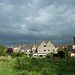Dark clouds over suburbia