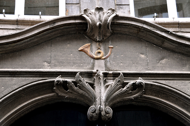 Post horn above a door