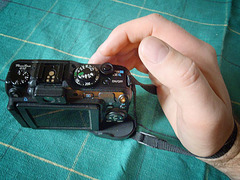 A hand strap for a pocket camera