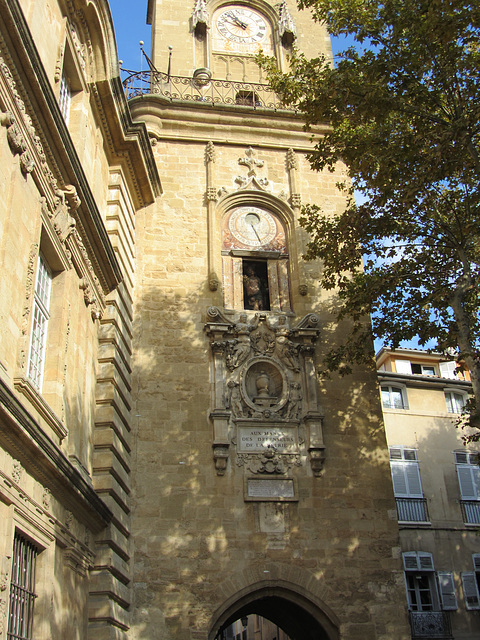 Aix en Provence clock and calendar tower.  Character in the portal changes with the seasons.