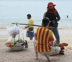 ordering lunch, fried chicken cooked on the beach