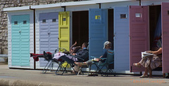 Candy-coloured beach huts