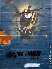 banksy's "grin reaper" in scrutton street (what's left of it)