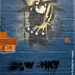 banksy's "grin reaper" in scrutton street (what's left of it)