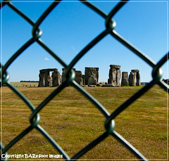 stonehenge_through_a_fence