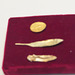 Monnaie et fragments de couronne en or.