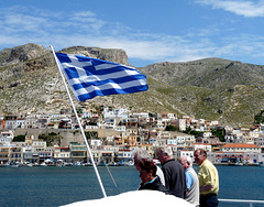 Catamaran Passengers Enjoying the Ride Past Kalymnos