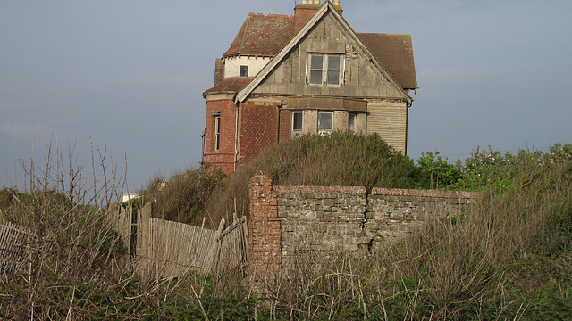 The old house is getting closer to the cliff's edge