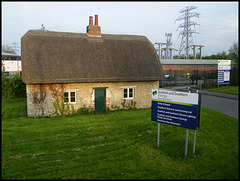 isolated thatched cottage