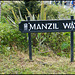 Manzil Way street sign