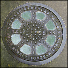 self-locking manhole cover