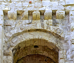 Arch head detail over the entrance to Farnham Castle Keep