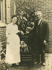 Man and Woman with Their Dog