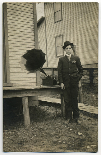 Young Man Posing with an Edison Cylinder Phonograph