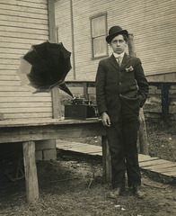 Young Man Posing with an Edison Cylinder Phonograph (Cropped)