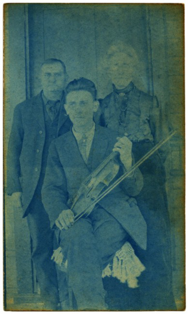 A Fiddler and His Parents