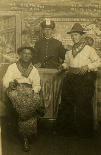 Two Cowboys and a Policeman at Brother Jones' Gin Mill