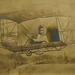 Inflight Infant in an Early Biplane