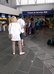 Queueing for a train ticket
