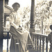 My paternal grandmother c. 1912. On the porch in the Vintage Theme Park