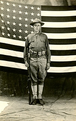 Soldier with Gun and Flag