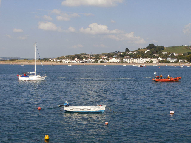 The lifeboat was bringing a crippled yacht in to the marina