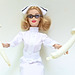 Nurse Barbie Wearing White Holding Two White Mushrooms with White Background