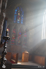 Morning sunlight streaming into Pluscarden Abbey
