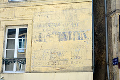 Bayeux 2014 – Old faded advertisement