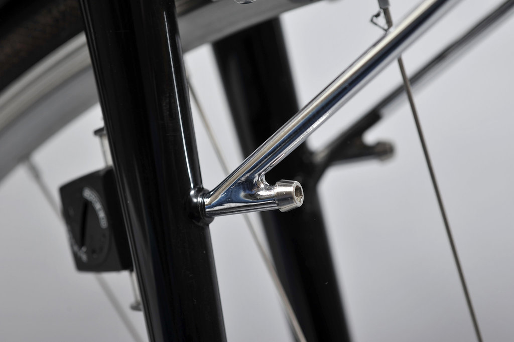 Front rack support attaches through the front, rather than the side, for a cleaner look