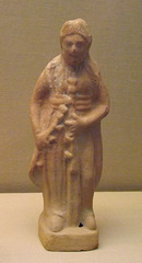 Terracotta Figure of a Woman Holding Double Pipes in the British Museum, April 2013