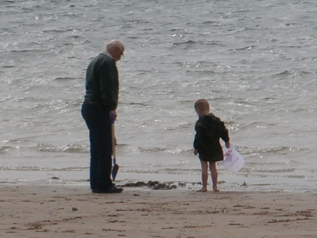 Grand-dad to the rescue of the castle from the tide