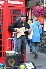 Edinburgh Festival Musician outside Deacon Brodie's.
