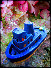 Tugboat in the sea of hortensias