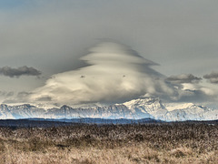 Lenticular clouds over the mountains