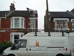 1. Getting the flue-liner onto the roof