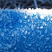 Hoar frost on a blue tarpaulin