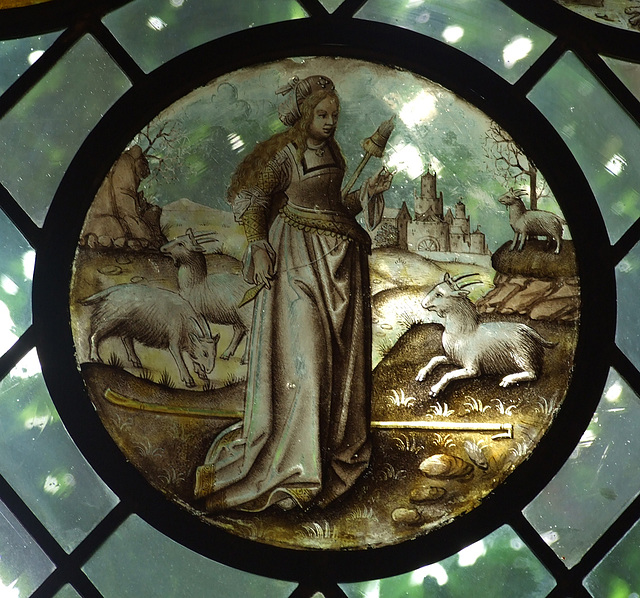 Allegorical Figure: Goatherdess with Distaff and Spindle Stained Glass Roundel in the Cloisters, June 2011