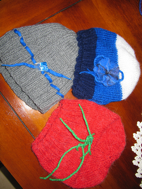 knitted cap with felt decorations