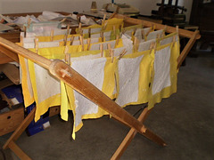 Paper hung to dry on common cleaning mops.
