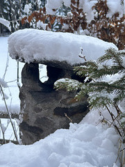 Snow covered chimney.