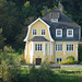Yellow Riverside House near Pochlarn
