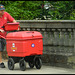 Royal Mail postman with trolley