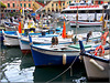 Tante barche classiche da pesca nel porto di Camogli