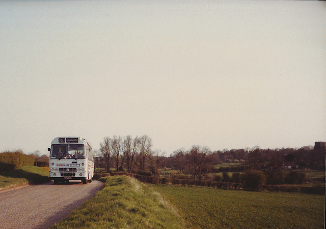 Ambassador Travel LL754 (MCL 936P) at Freckenham - 22 Apr 1985