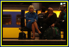 KLM crossed legs blonde