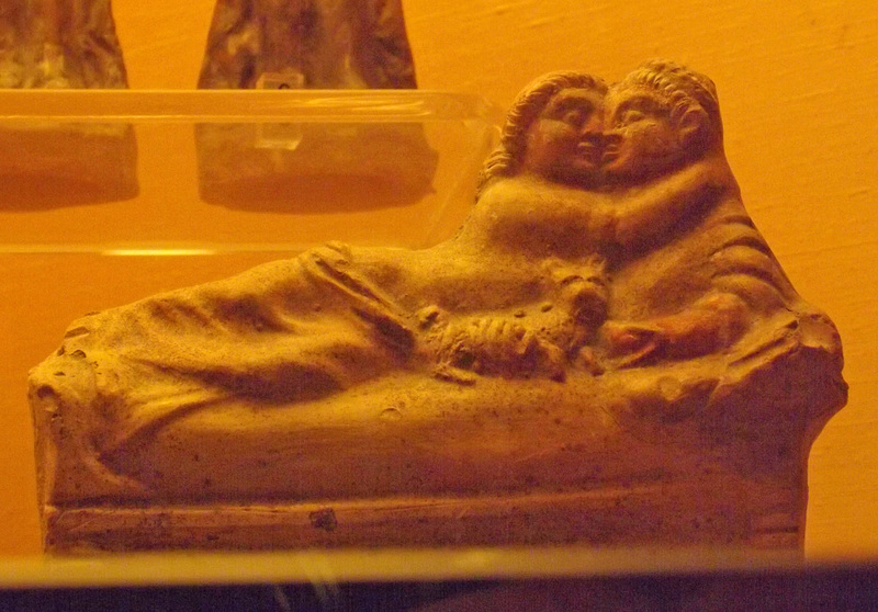 Kissing Couple on a Kline Terracotta Figurine from Pompeii in the Naples Archaeological Museum, July 2012