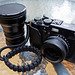 X100T with WCL and TCL and JJC hood and paracord strap